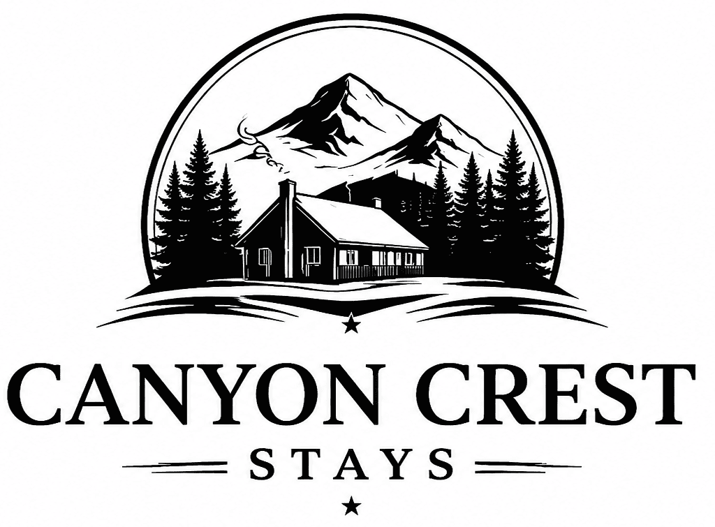 Logo for Canyon Crest Stays featuring a black and white illustration of a cabin in front of pine trees and mountains.